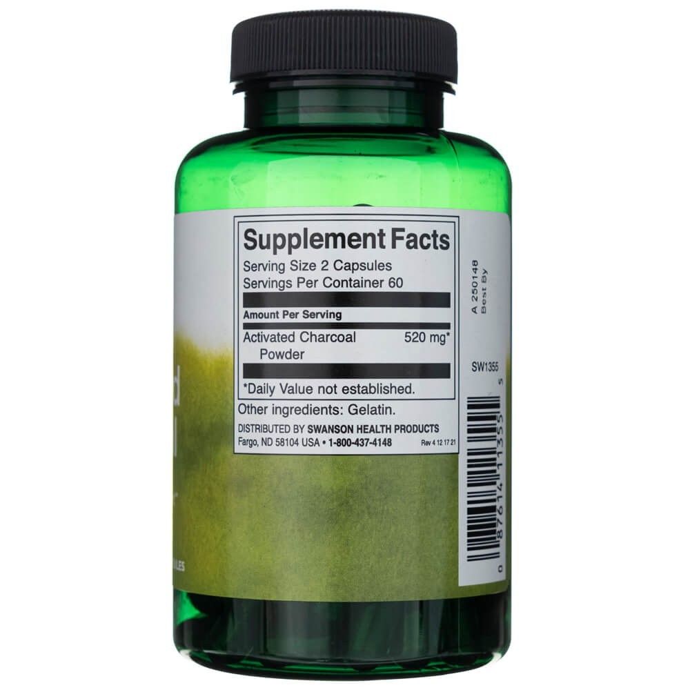 Achterkant van een groene fles Swanson Actieve Kool met voedingsfeiten en ingrediënten.