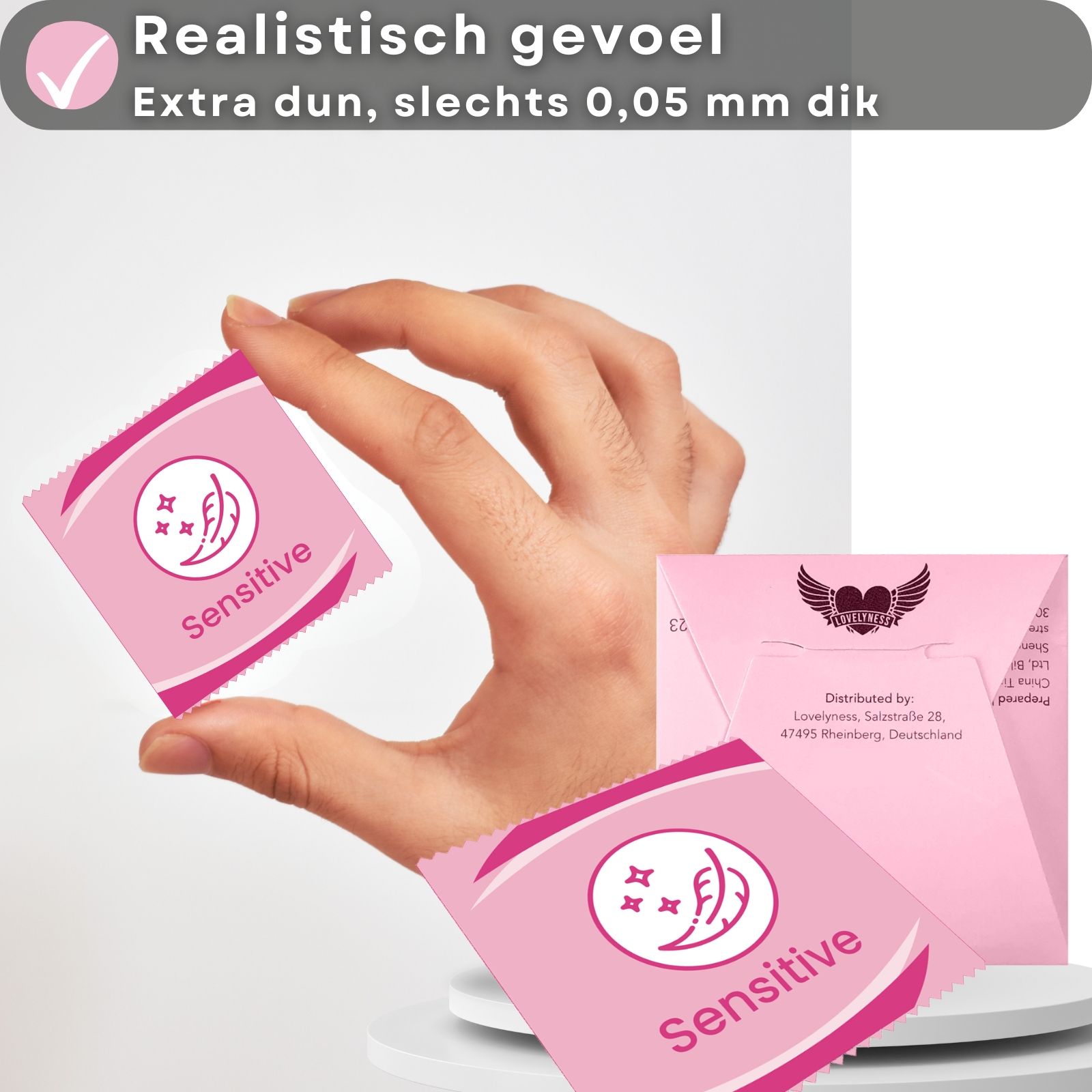 Condooms en roze verpakking. Tekst: "Gefühlsecht", "extra dünn, nur 0.05mm Dicke".