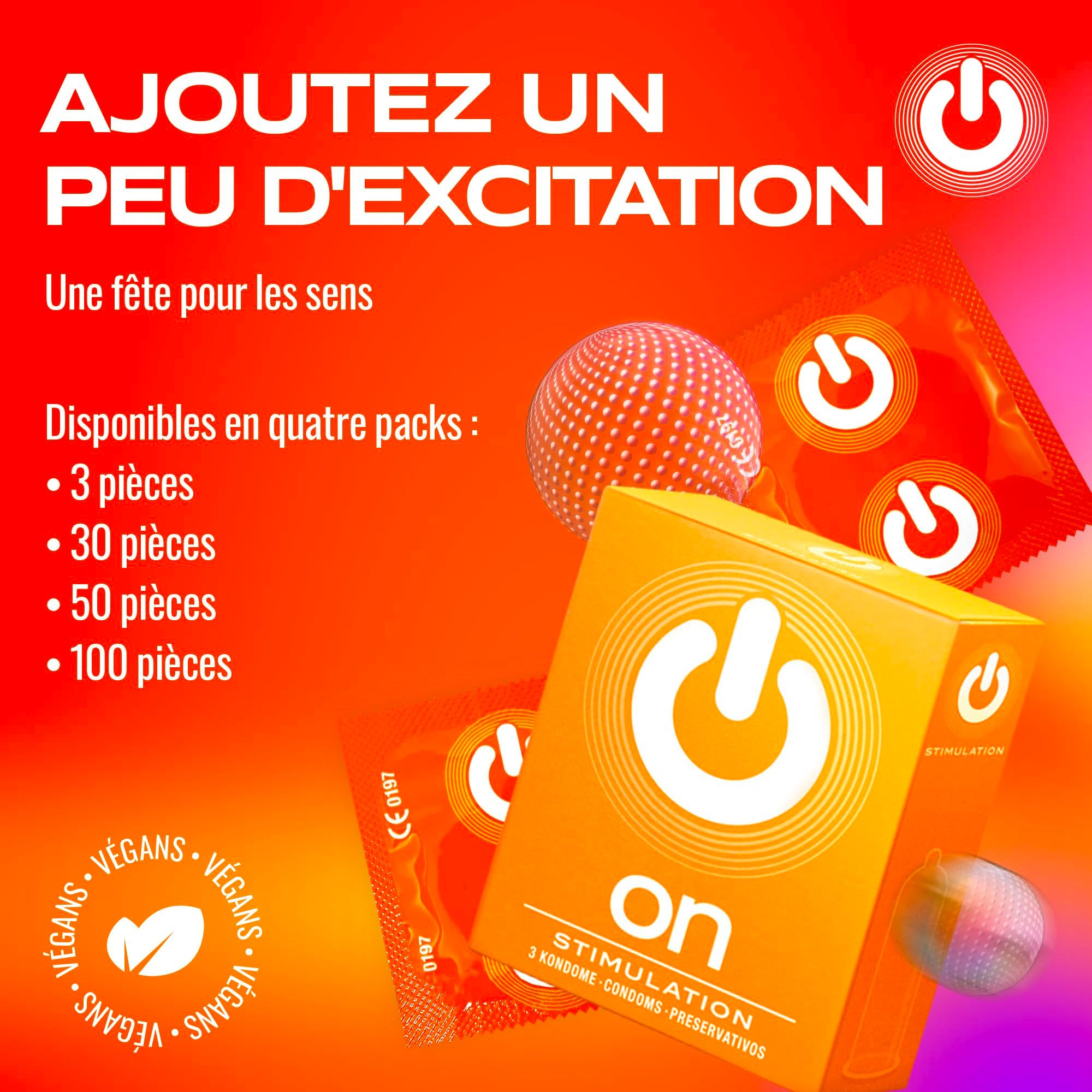 Préservatif rouge texturé à picots, en matière spéciale transparente.