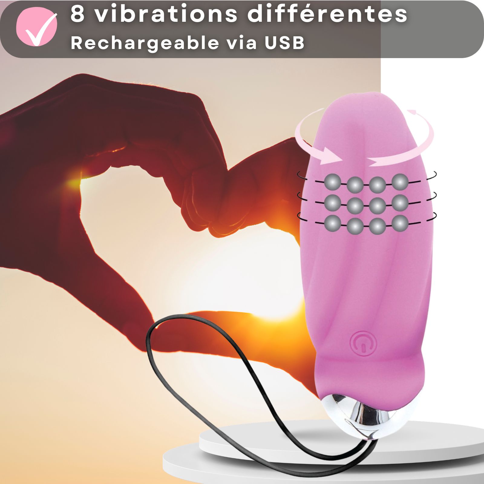 Vibromasseur rose avec télécommande. 9 cm de long, 3,3 cm de diamètre. 8 modes de vibration. Rechargeable USB.
