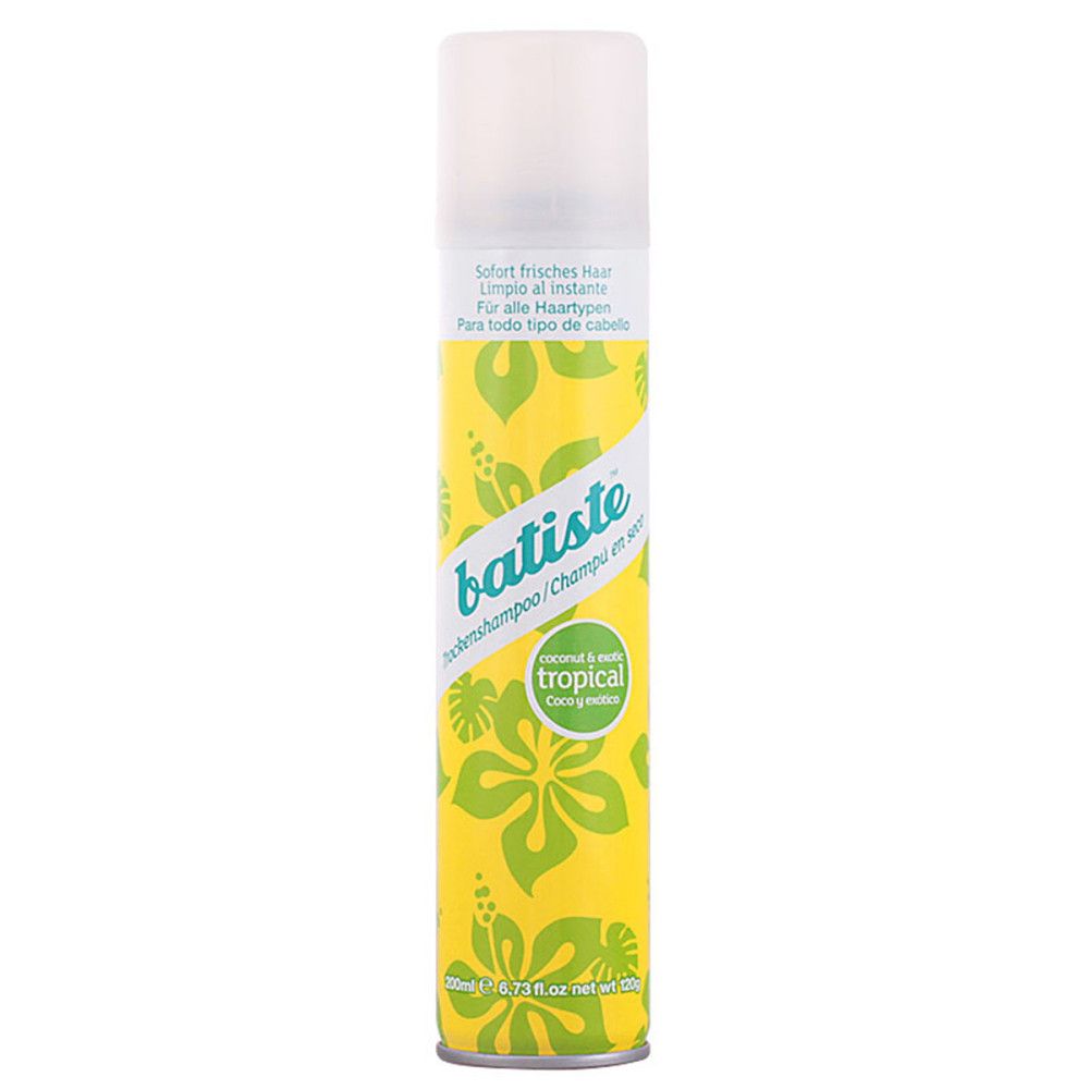 Batiste Droogshampoo Tropical Coconut & Exotic. Gele spuitbus met tropische bladeren en bloemen.