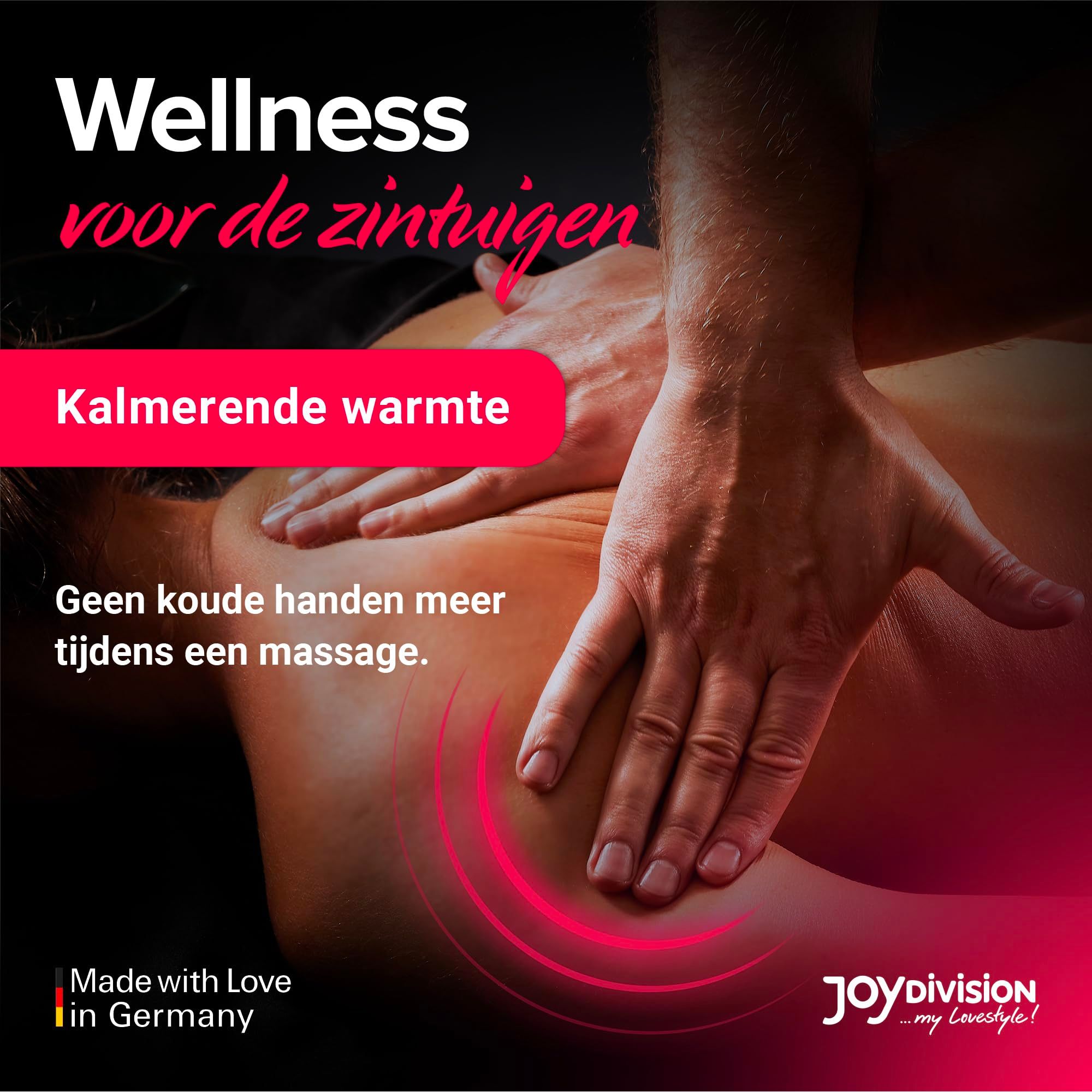 Fles frambozenmassageolie, omringd door frambozen.