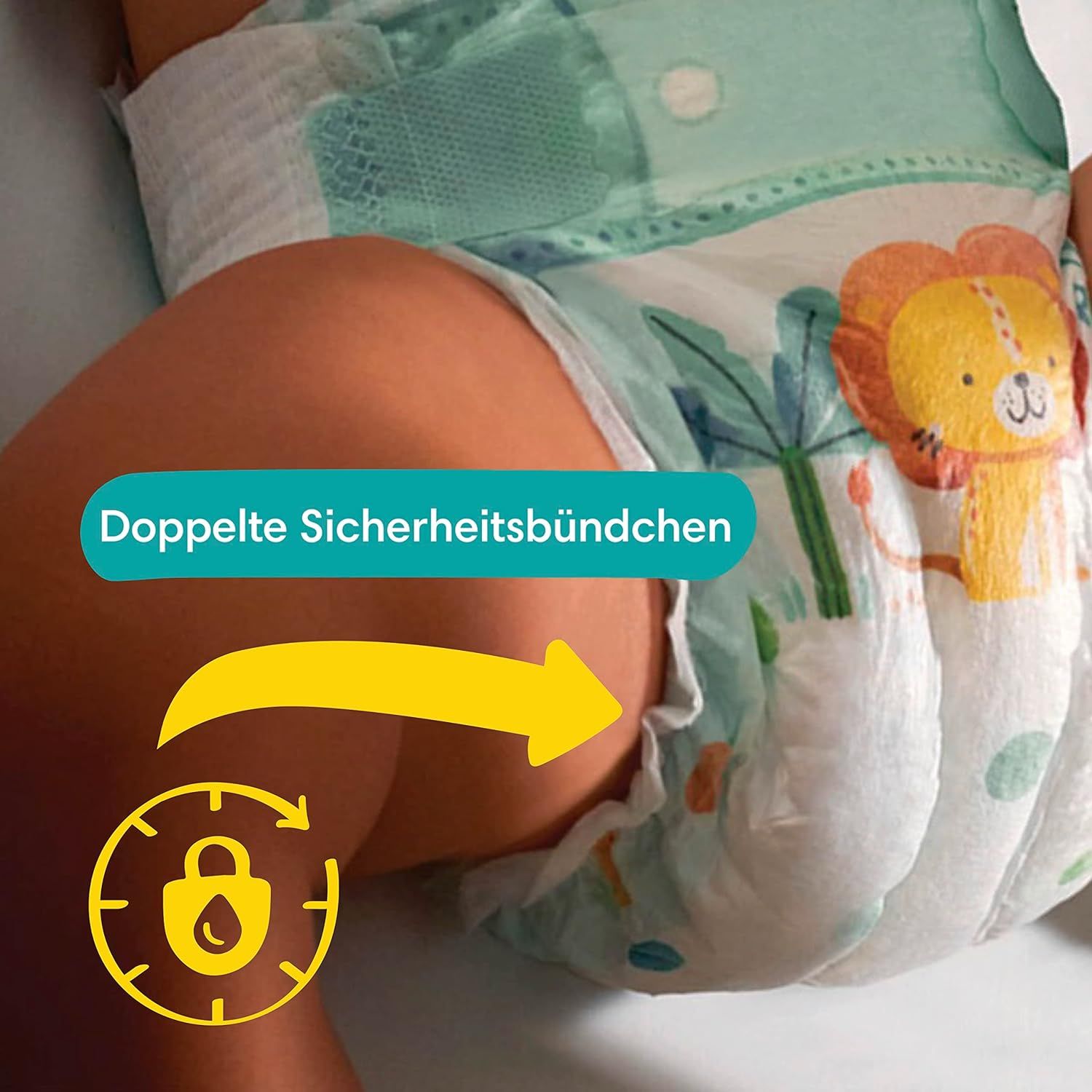 Close-up van een baby met een luier. De tekst 'Doppelte Sicherheitsbündchen' en een symbool zijn zichtbaar.
