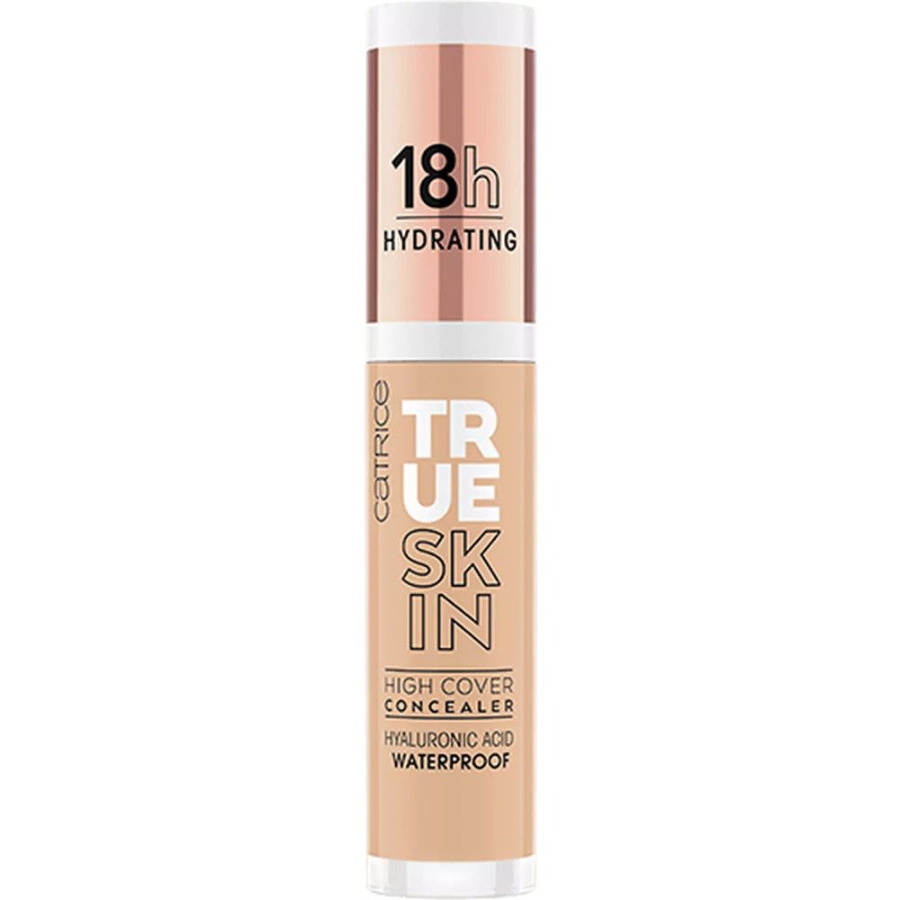 Tube de correcteur avec bouchon or rose. Inscription: True Skin, High Cover Concealer, Acide Hyaluronique, Waterproof. Bouchon 18h Hydrating.