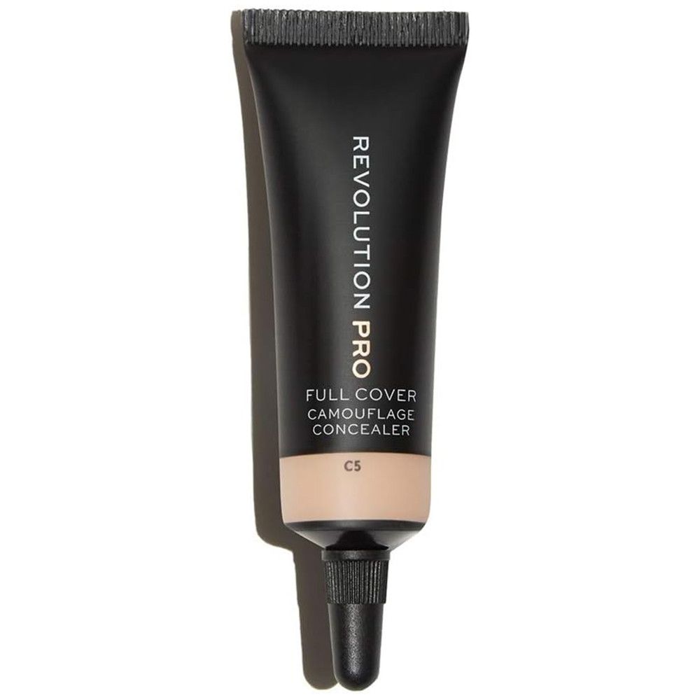 Tube noir avec texte 'REVOLUTION PRO' et 'FULL COVER CAMOUFLAGE CONCEALER'. Teinte C5 visible.