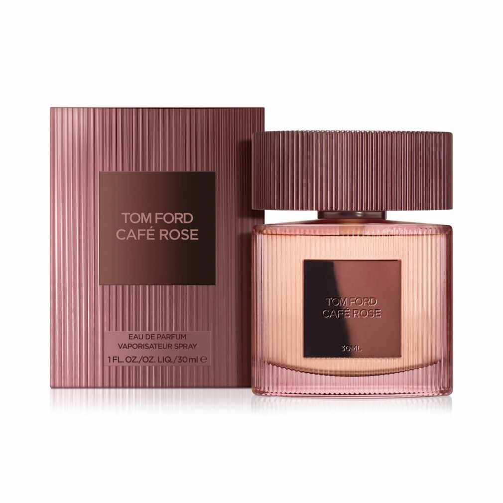 Flacon de parfum rose avec emballage. "TOM FORD Café Rose" est inscrit sur l'emballage et le flacon.