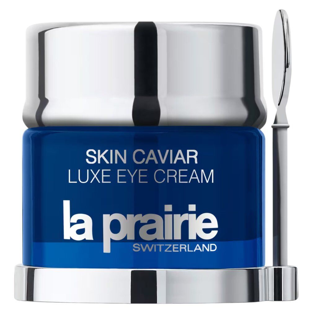 Blauwe pot met zilveren deksel en spatel. Opschrift: Skin Caviar Luxe Eye Cream, La Prairie, Switzerland.