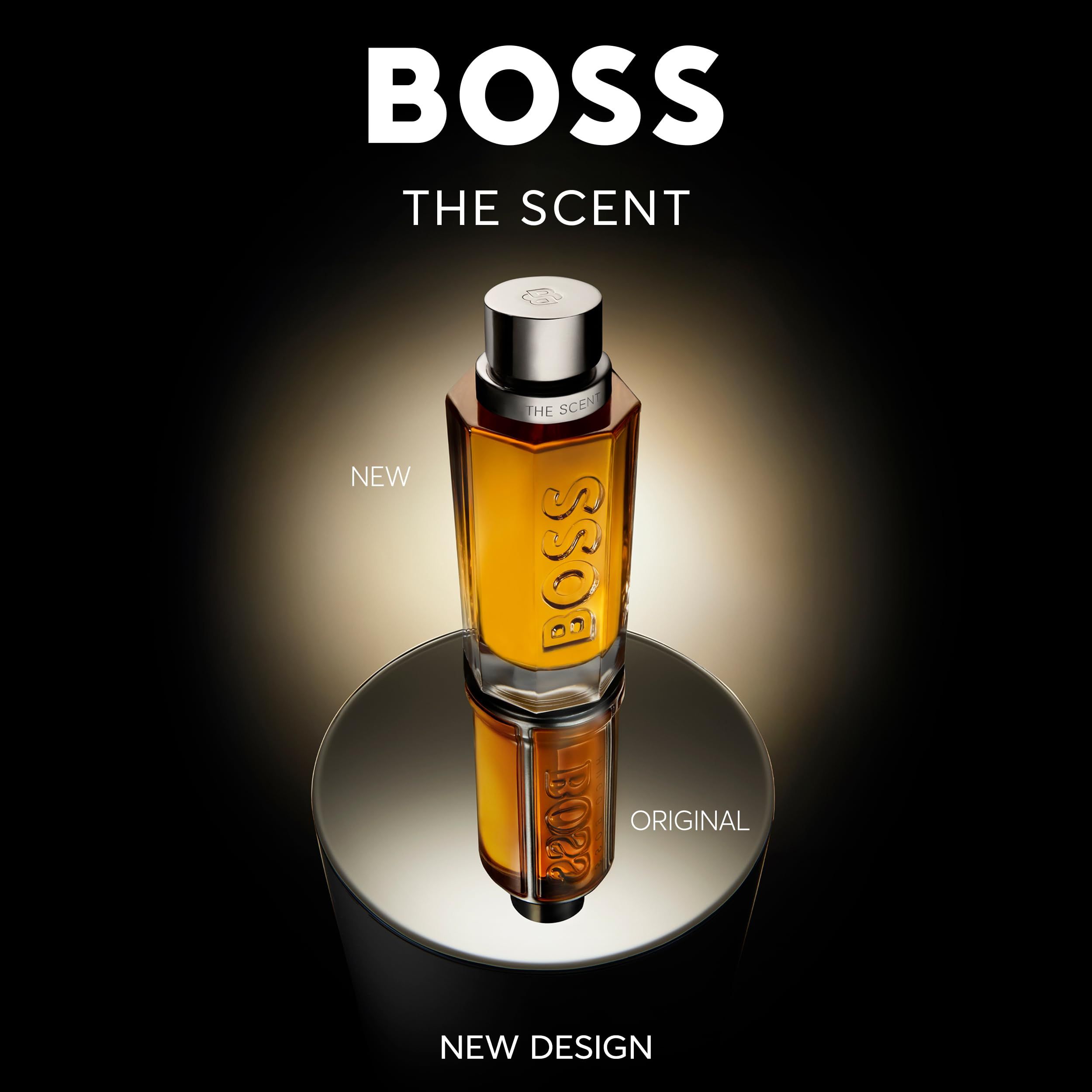 Hugo Boss The Scent Eau de Parfum fles op spiegelend oppervlak, verlicht.