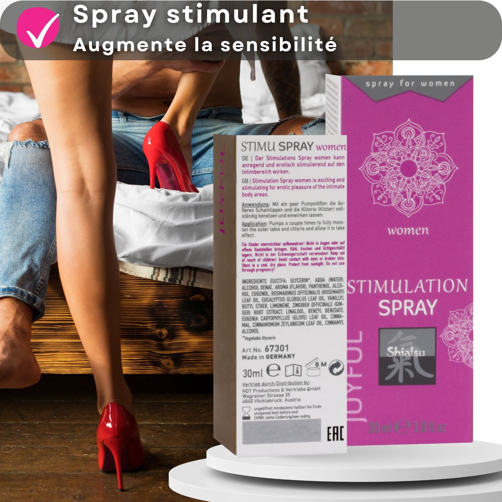 Emballage et flacon. Texte : Stimulation Spray, Shiatsu. Couple en arrière-plan. Chaussures rouges.