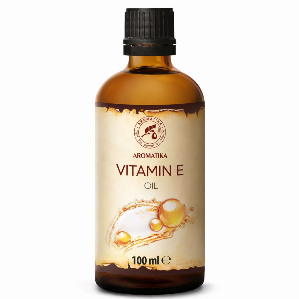 AROMATIKA Vitamine E Olie in bruine glazen fles met zwarte dop. Etiket met druppelmotief.