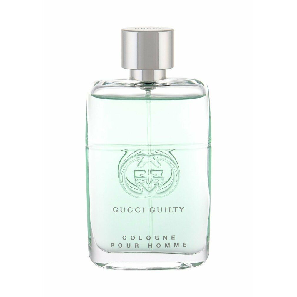 Glazen fles met zilveren dop. Opschrift: Gucci Guilty Cologne pour Homme. Logo en tekst.