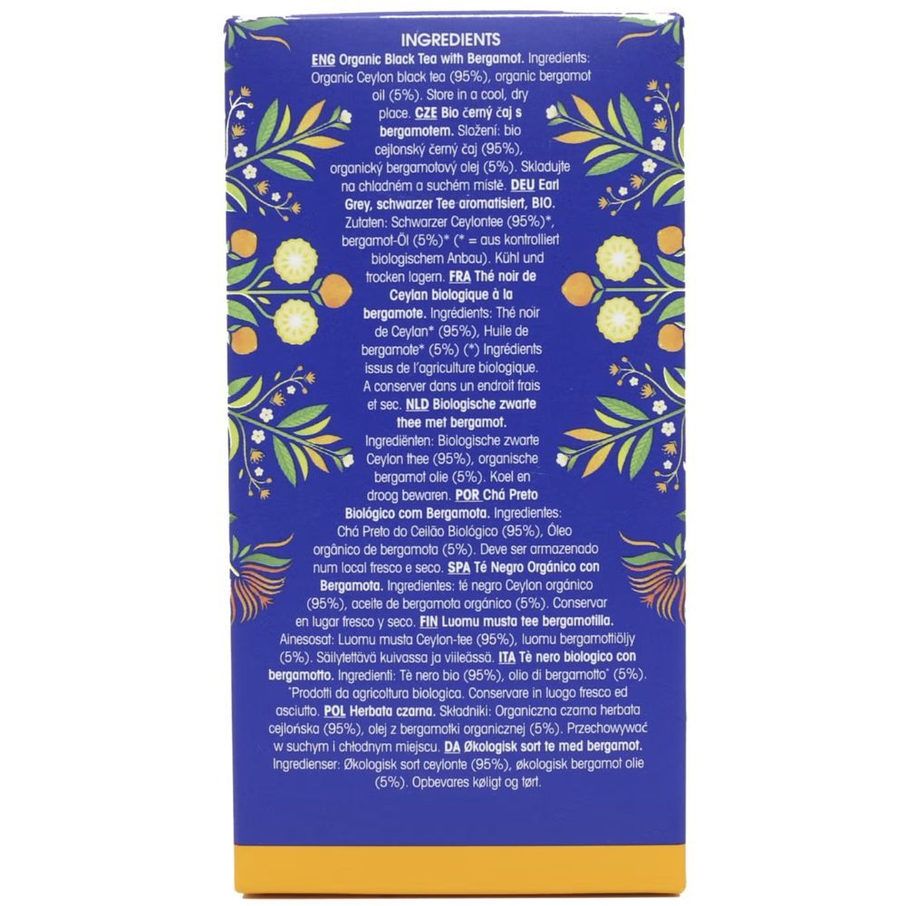 Achterkant van een blauwe doos met ingrediëntenlijst in verschillende talen. Opschrift: English Tea Shop, Organic.
