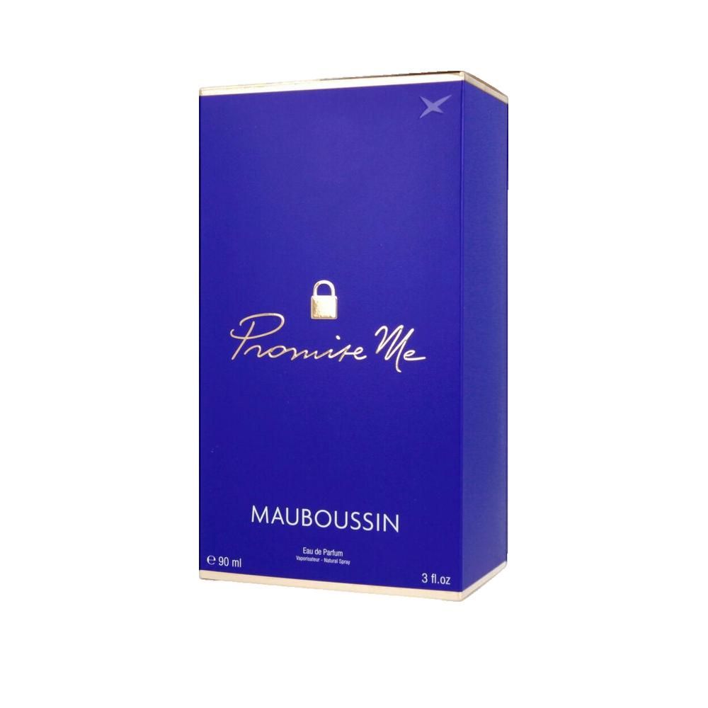 Blauwe rechthoekige verpakking. Opschrift: Promise Me, Mauboussin. Gouden logo en tekst.