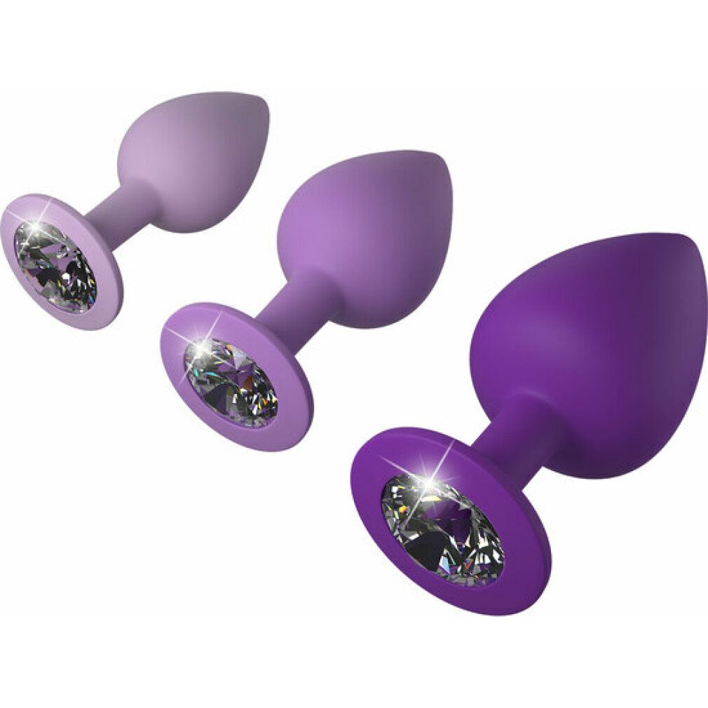 Trois plugs anaux violets avec ornements en cristal, tailles variées.