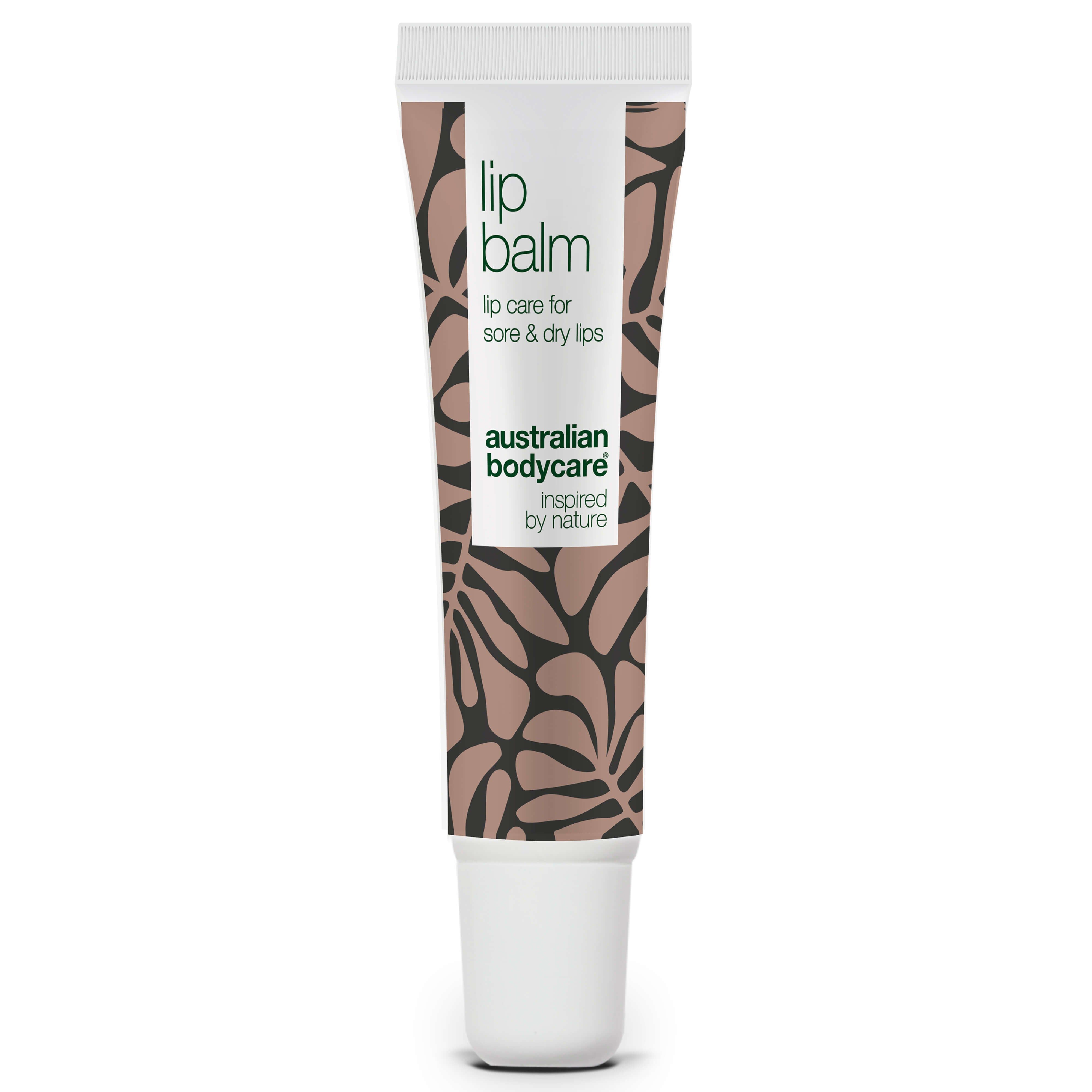 Tube de baume à lèvres. Bouchon blanc, motif marron. Inscription : lip balm, australian bodycare.