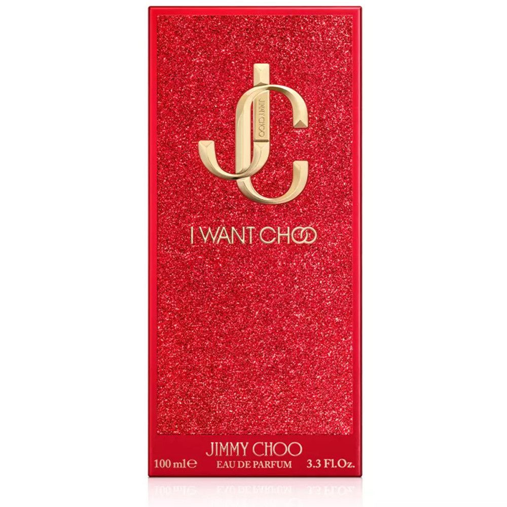 Rode rechthoekige verpakking met gouden logo en tekst. Tekst: I WANT CHOO, JIMMY CHOO, Eau de Parfum.