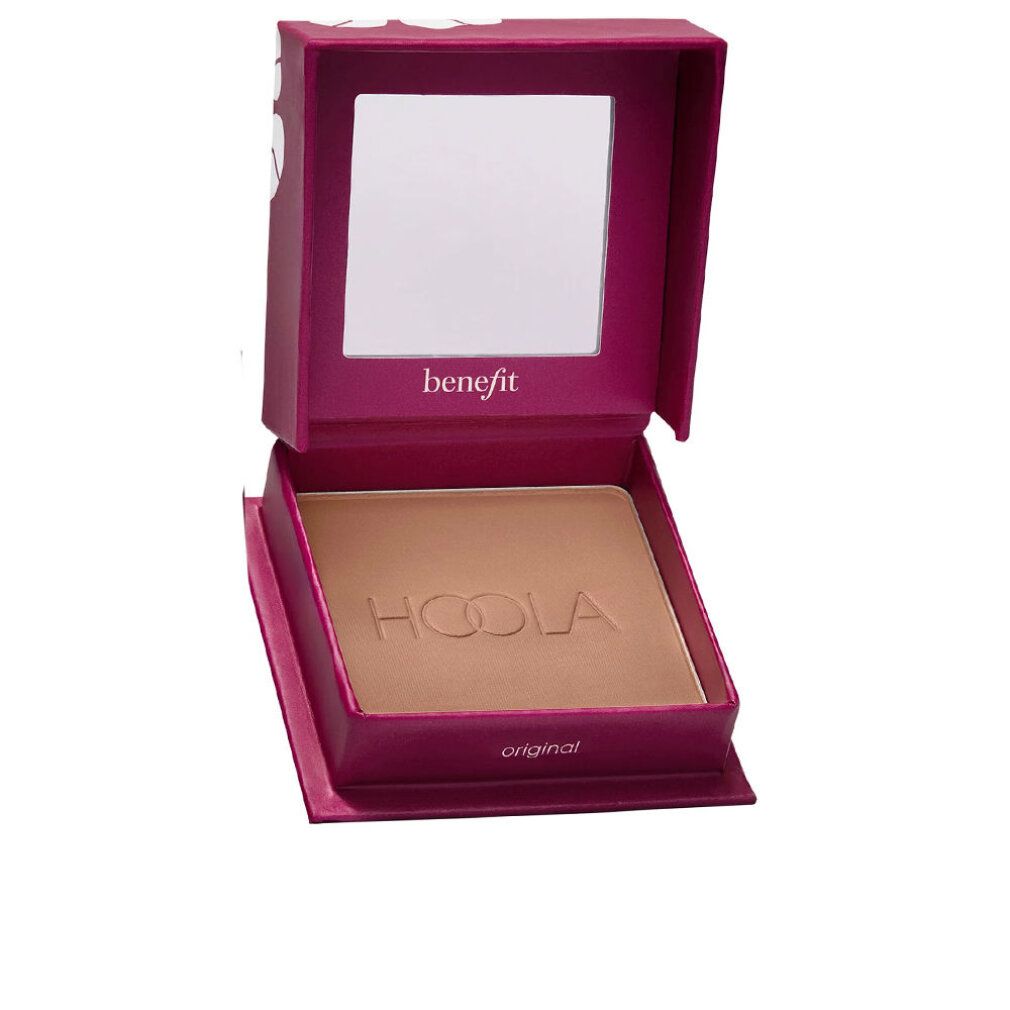 Boîtier de bronzer ouvert. Bronzer avec inscription Hoola. Miroir dans le couvercle. Emballage rose.