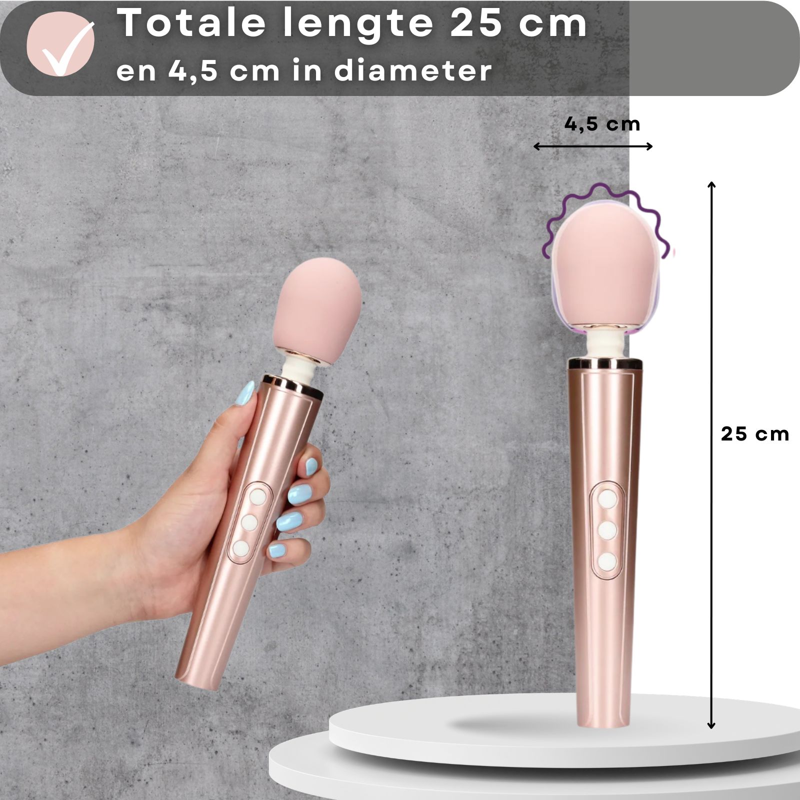 Vibrator, roze. 25cm lang, 4,5cm diameter. Roze kop, cilindrische handgreep. Hand houdt vibrator vast.