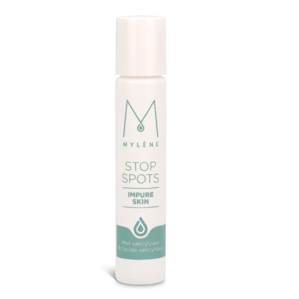 Stylo blanc Mylène Stop Spots. Texte : Stop Spots Impure Skin. Avec acide salicylique. Bande verte.