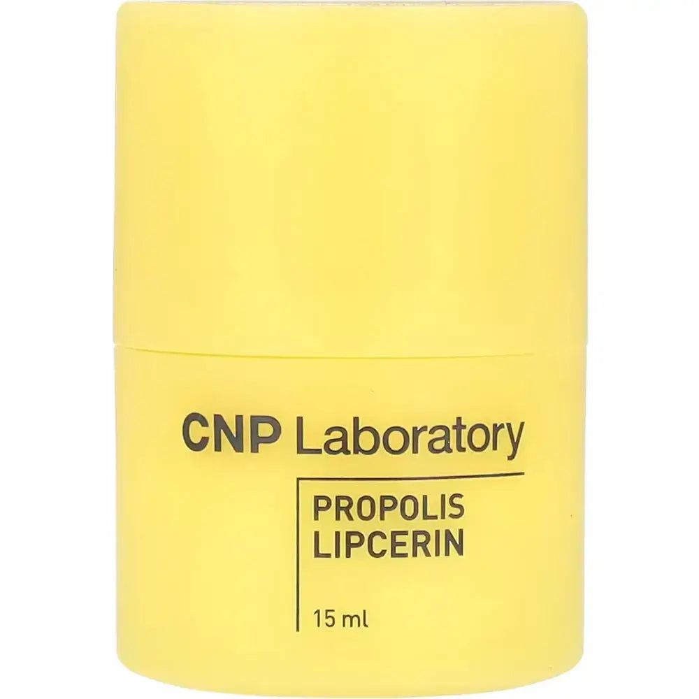Contenant de baume à lèvres jaune. Texte: CNP Laboratory PROPOLIS LIPCERIN 15 ml.