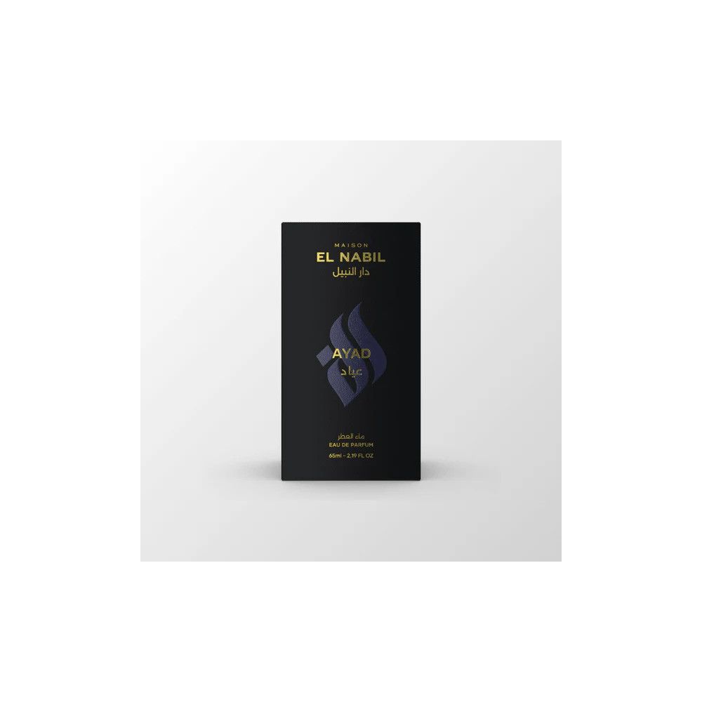 Boîte de parfum noire avec inscription dorée et un symbole stylisé.