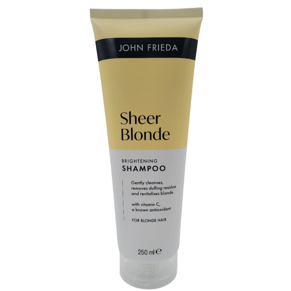 Tube de shampooing John Frieda Sheer Blonde. Contient de la vitamine C. Pour cheveux blonds. 250 ml. Inscription: Brightening Shampoo.
