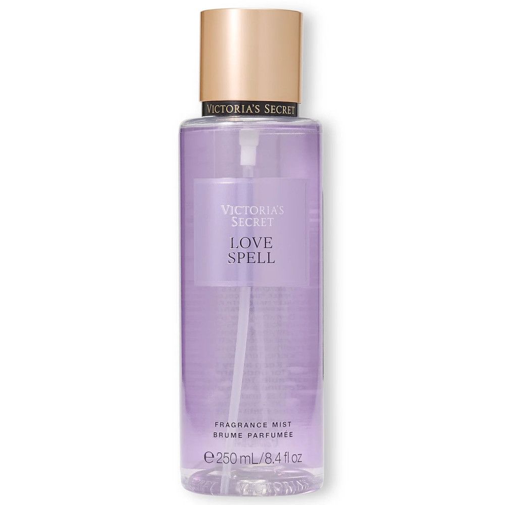 Brume pour le corps Victoria's Secret Love Spell. Flacon violet, capuchon doré. Texte et volume.