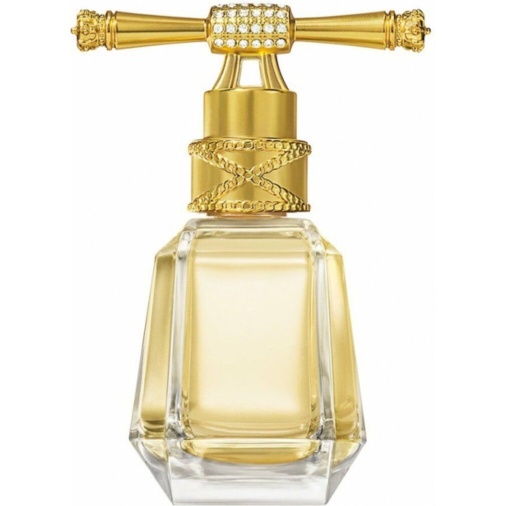 Flacon doré avec base en verre facetté et vaporisateur en T orné de cristaux.