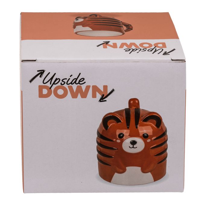 Becher OOTB Tigre, capovolto, in verpakking. Oranje-bruin keramiek, tijgerontwerp. Opschrift "Upside Down" op de doos.