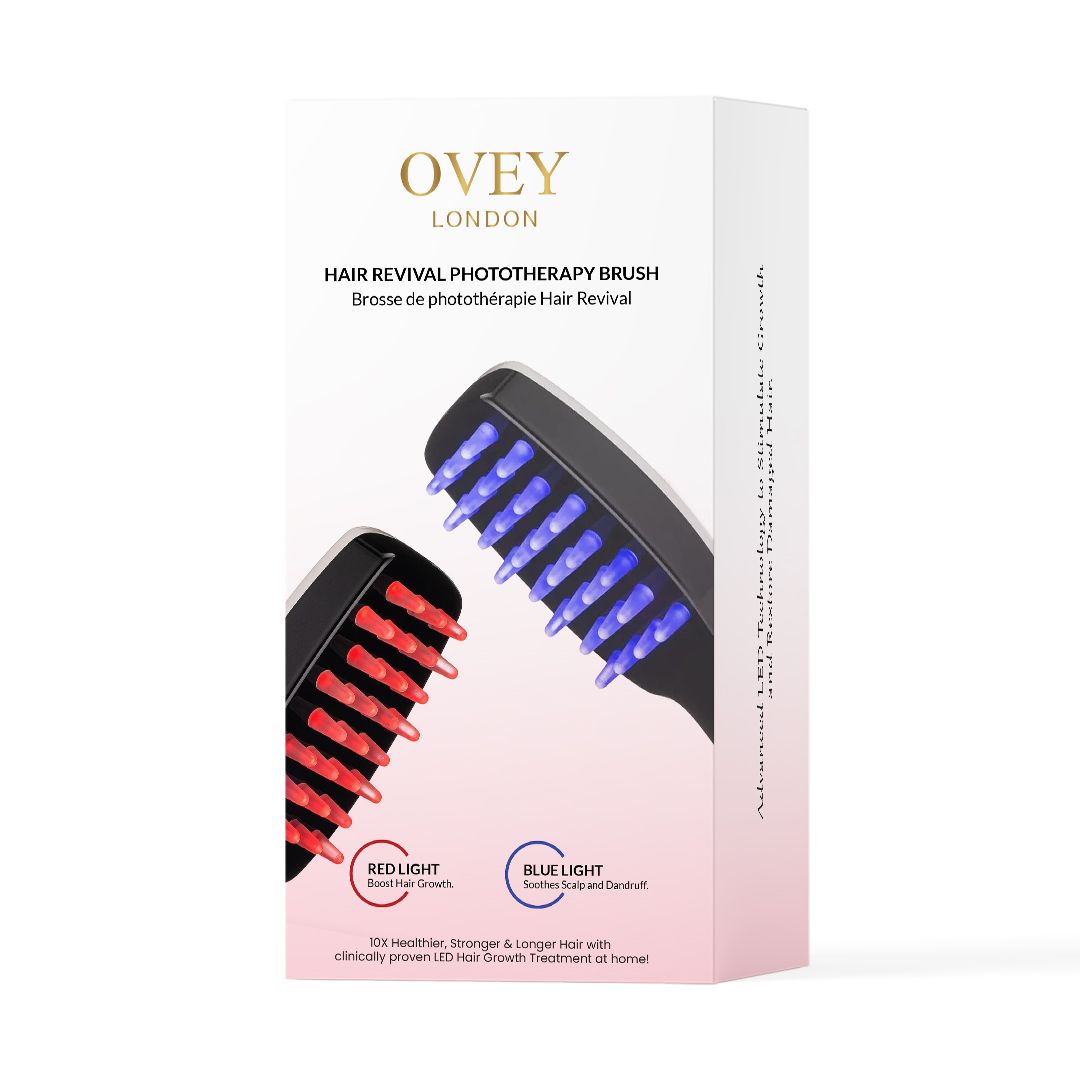Emballage du produit. Impression : brosse à cheveux avec lumière rouge et bleue. Texte : OVEY LONDON. Rose et blanc.