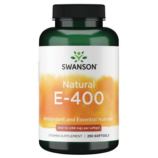 Groene fles met zwarte dop. Etiket met "SWANSON", "Natural E-400" en "Vitamin Supplement". 