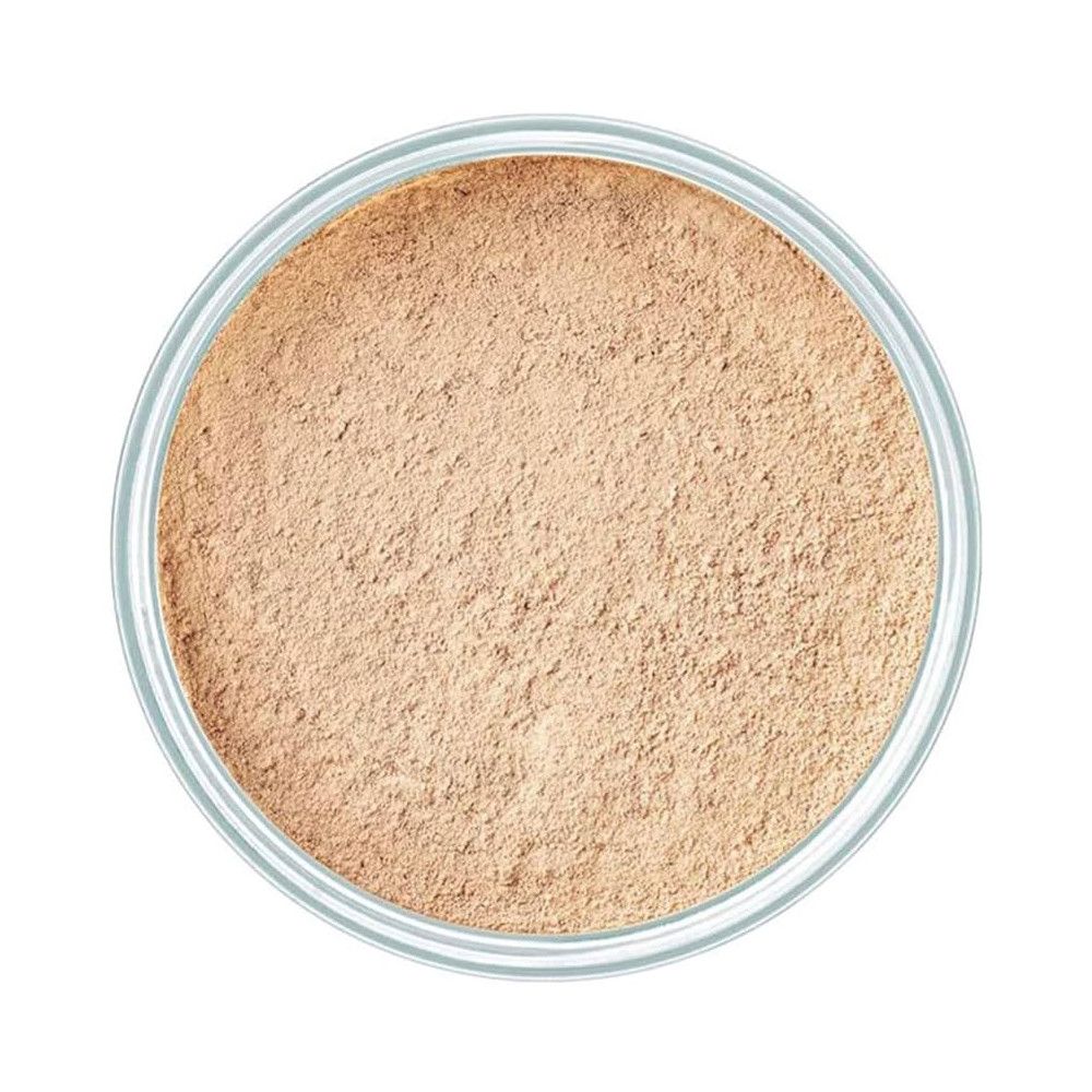 Vue de dessus d'un récipient de poudre libre. Couleur beige.