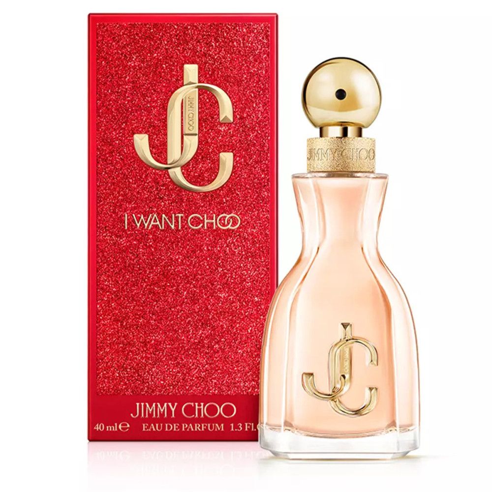 Flacon de parfum à côté d'une boîte rouge. Flacon avec bouchon et logo dorés. Boîte avec "I WANT CHOO" et "JIMMY CHOO".