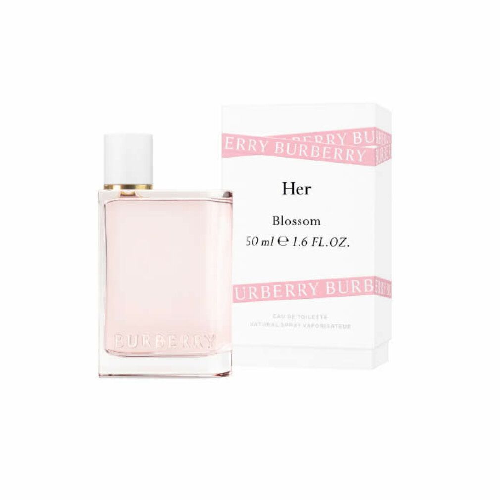 Flacon de parfum et emballage. Flacon avec bouchon blanc, liquide rose. Emballage avec texte: Burberry Her Blossom.