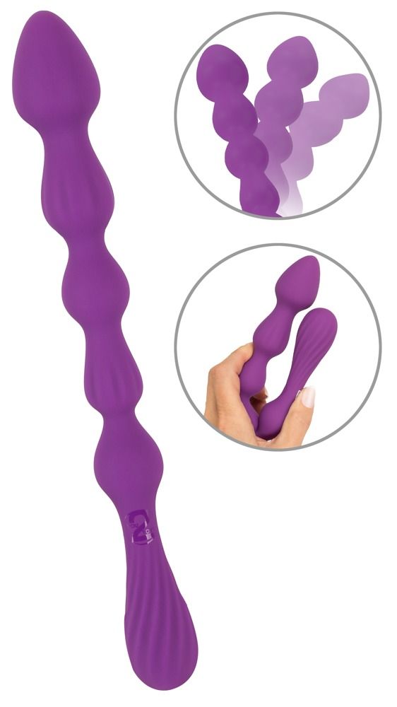 Stimulateur violet ondulé avec manche côtelé et un bouton.
