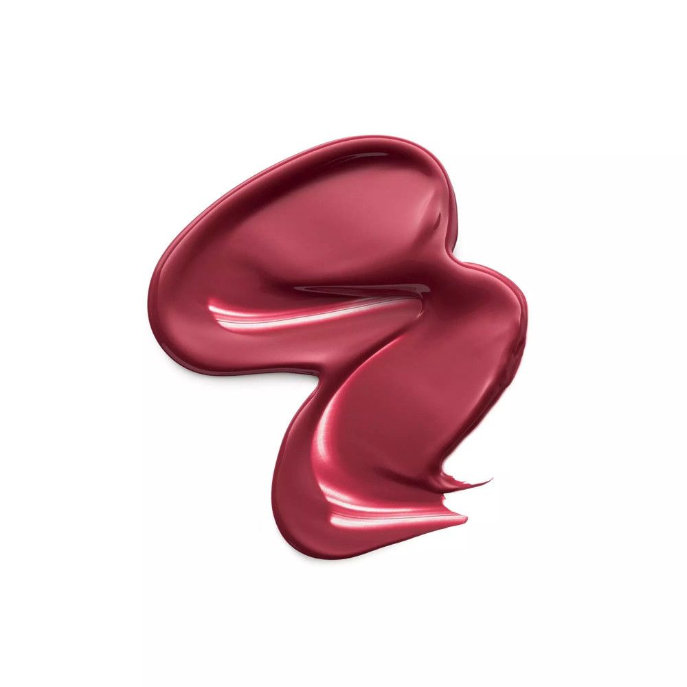 Tache de rouge à lèvres liquide. Couleur rouge foncé avec fini brillant. Forme: irrégulière, ondulée.