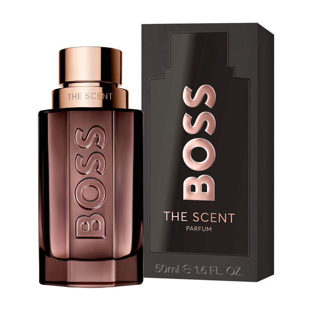 Parfumfles en verpakking. Fles met BOSS-logo en "THE SCENT". Zwarte verpakking met logo en tekst.