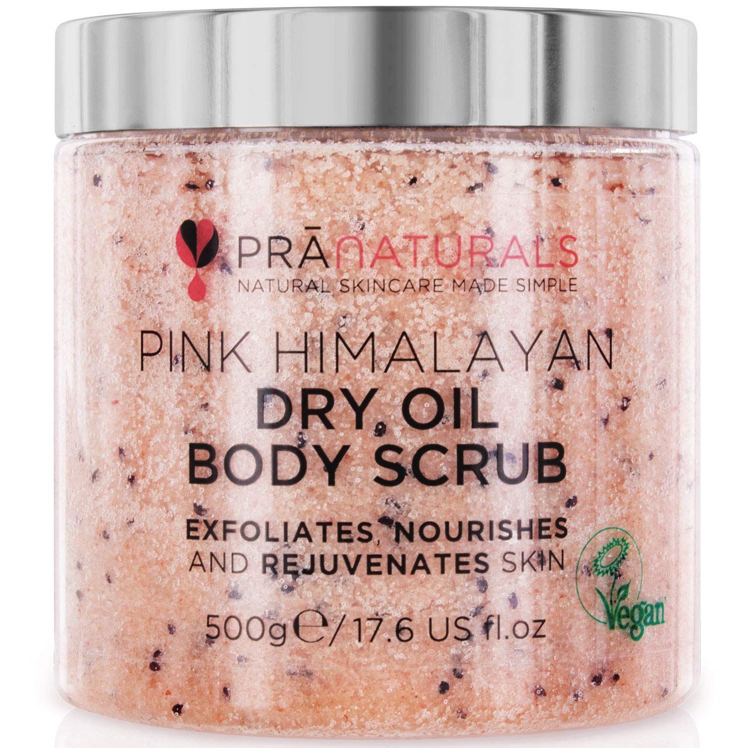 PraNaturals bodyscrub in transparante pot met zilveren deksel. Opschrift: Pink Himalayan Dry Oil Body Scrub. Vegan zegel.