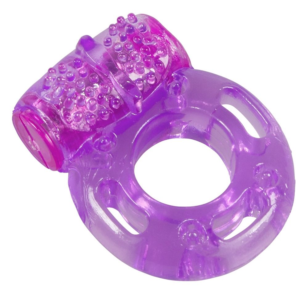 Anneau pénien violet avec module vibrant et picots. Forme annulaire avec ouvertures. En matériau transparent.