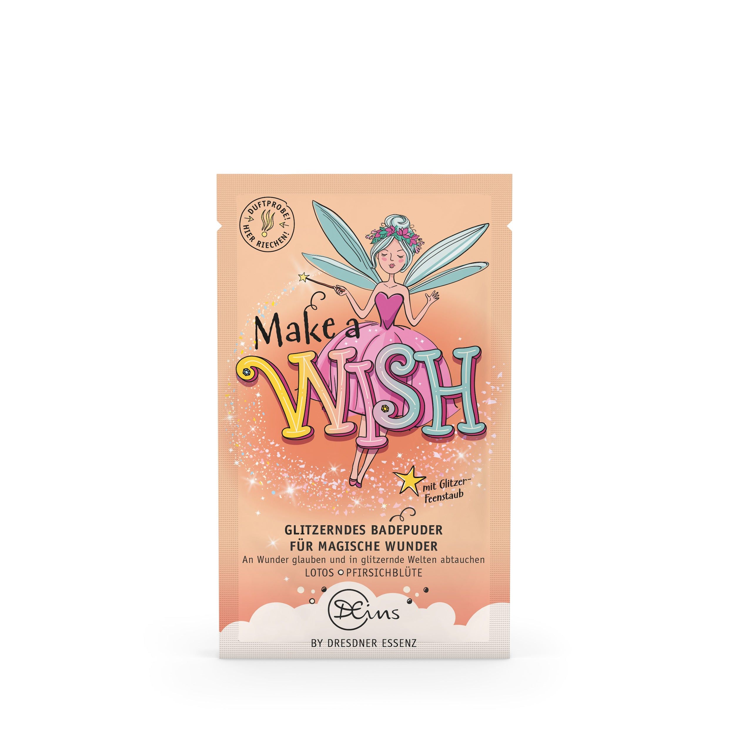 Sachet de bain rose avec impression. Inscription "Make a Wish" et fée. Texte : Poudre de bain scintillante pour des merveilles magiques. Marque : Dresdner Essenz.