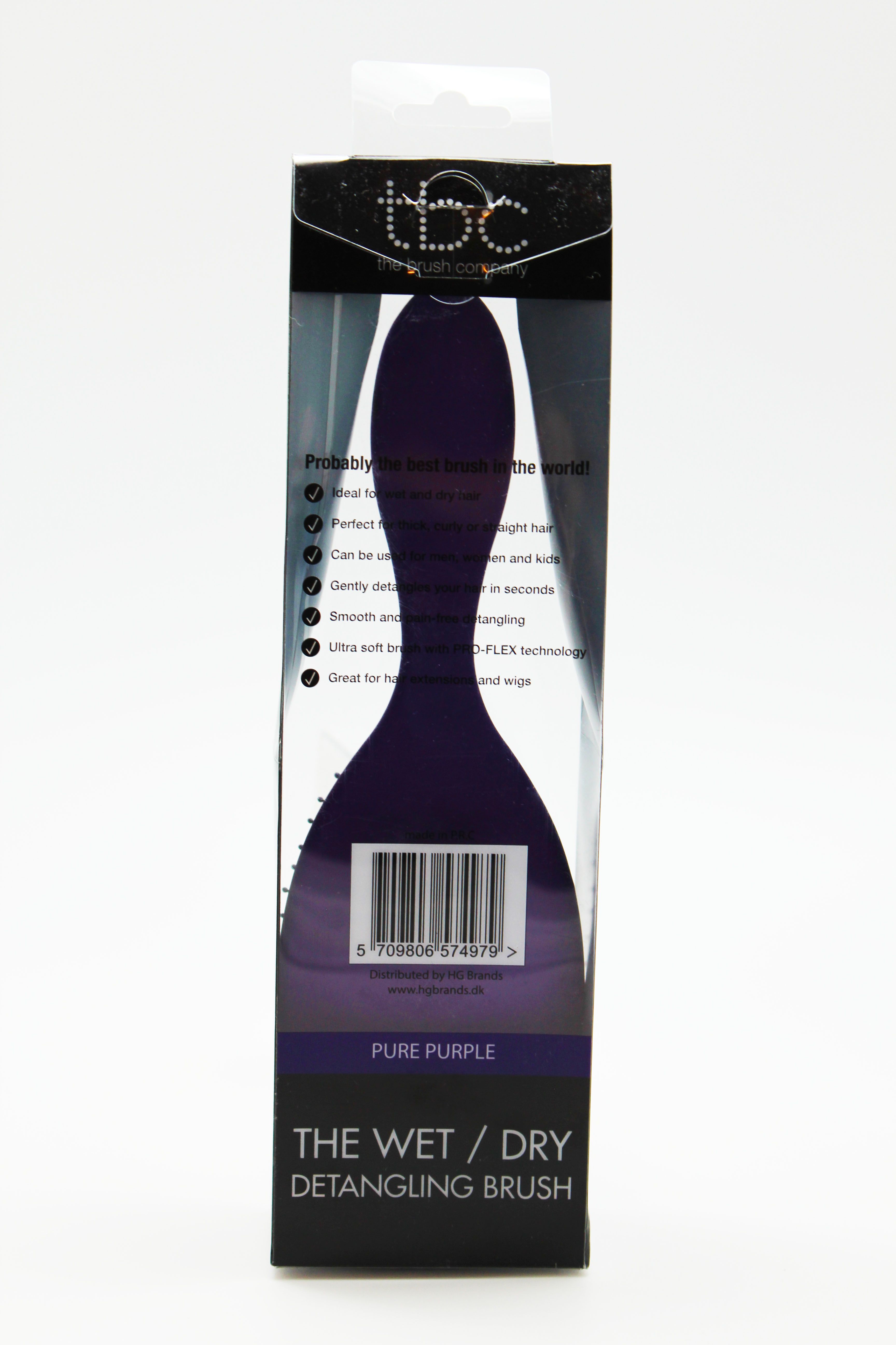 Arrière de l'emballage de la brosse à cheveux TBC Wet & Dry violette avec les caractéristiques du produit.