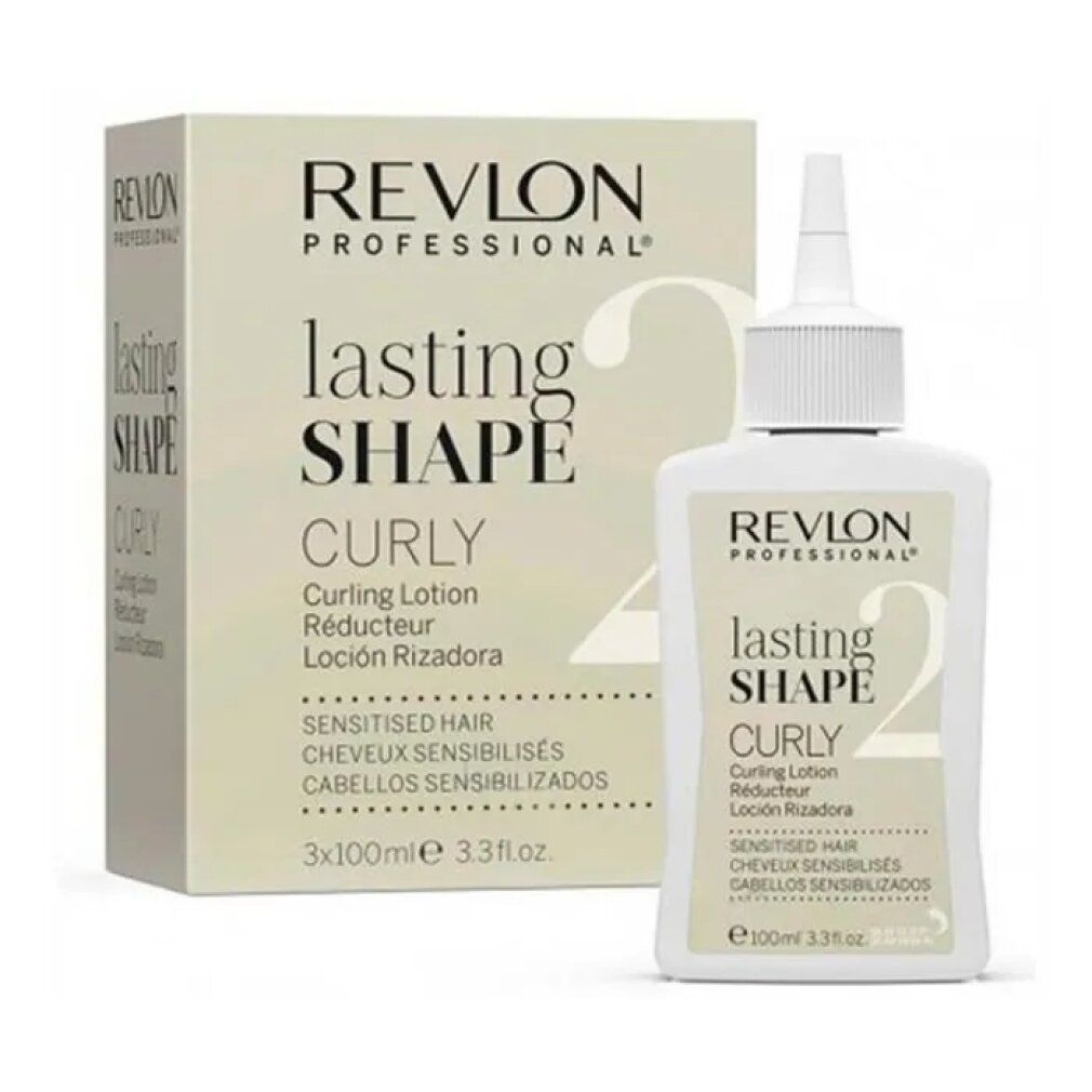 Een fles en een doos Revlon Lasting Shape 2 Curly Lotion. Opschrift: Curly, Gevoelig haar.