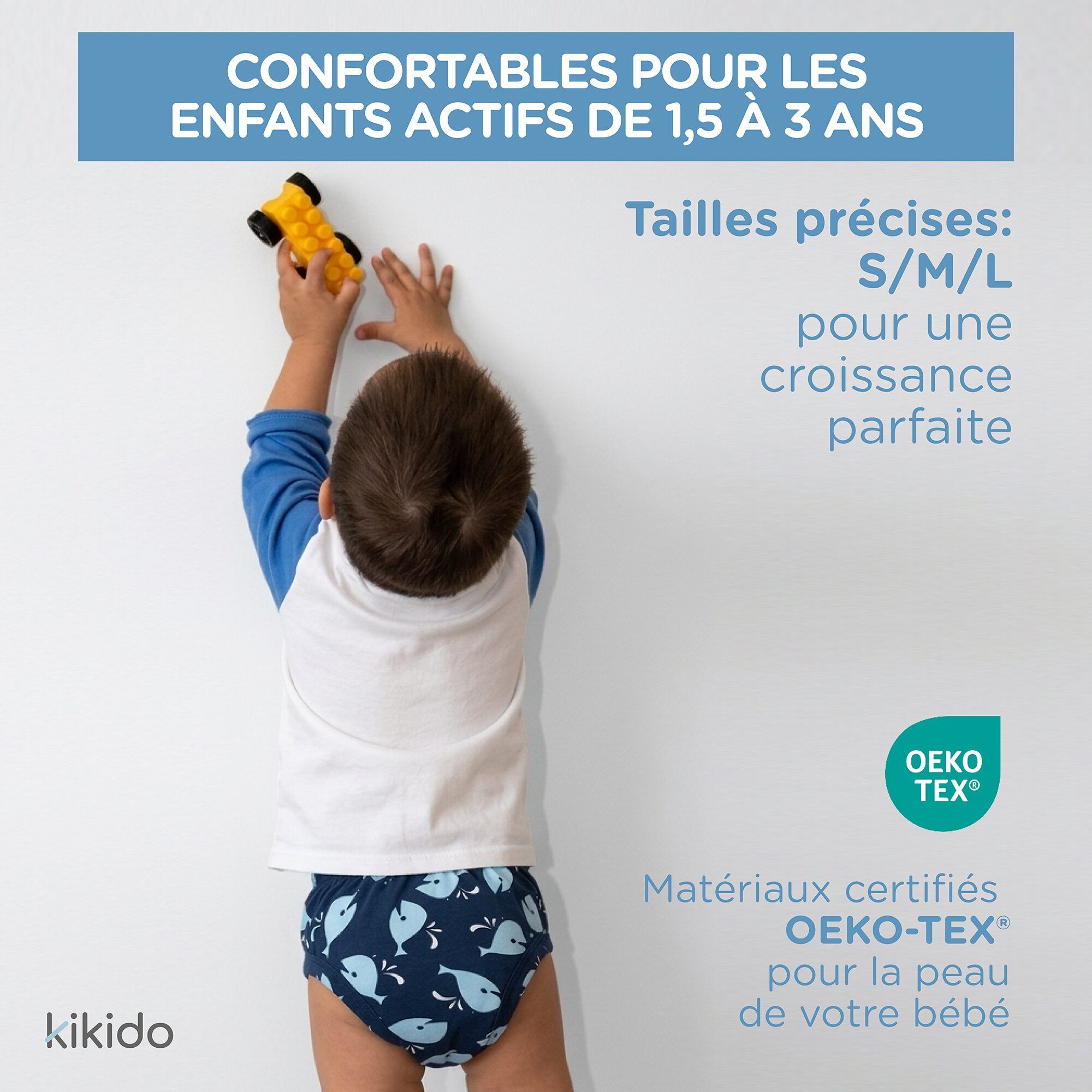 Culotte d'apprentissage bleu marine avec dauphins, couche TPU imperméable et coton respirant.