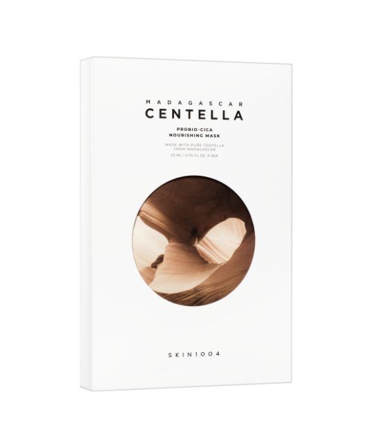Boîte de produit blanche avec logo et nom. Une image abstraite marron est affichée sur le devant.