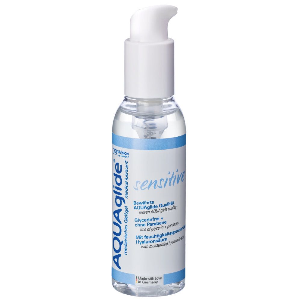 Flacon transparent avec pompe blanche. Inscriptions AQUAglide, sensitive et autres informations.