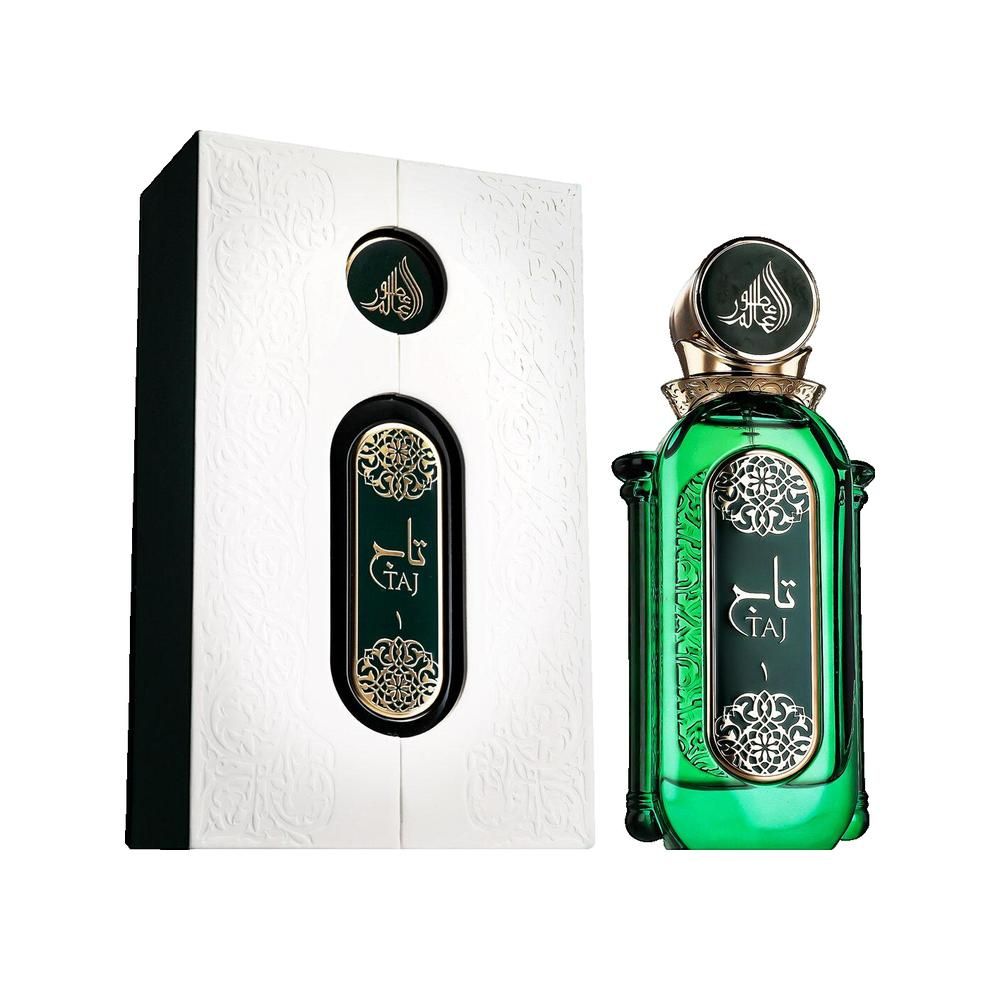 Groene glazen fles met gouden dop en verpakking. Arabische letters en bloemmotieven. Witte doos.