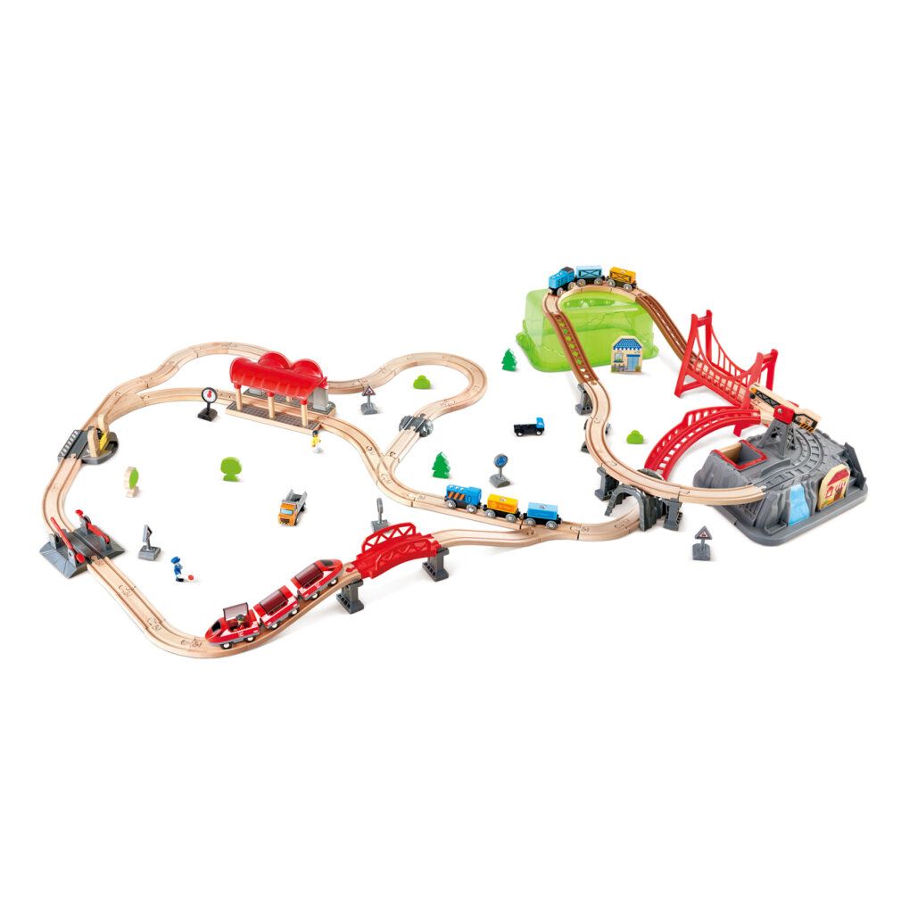 Treinset met bruggen, gebouwen en treinen. Inclusief rode en bruine bruggen, groene heuvels en grijze rotsen.
