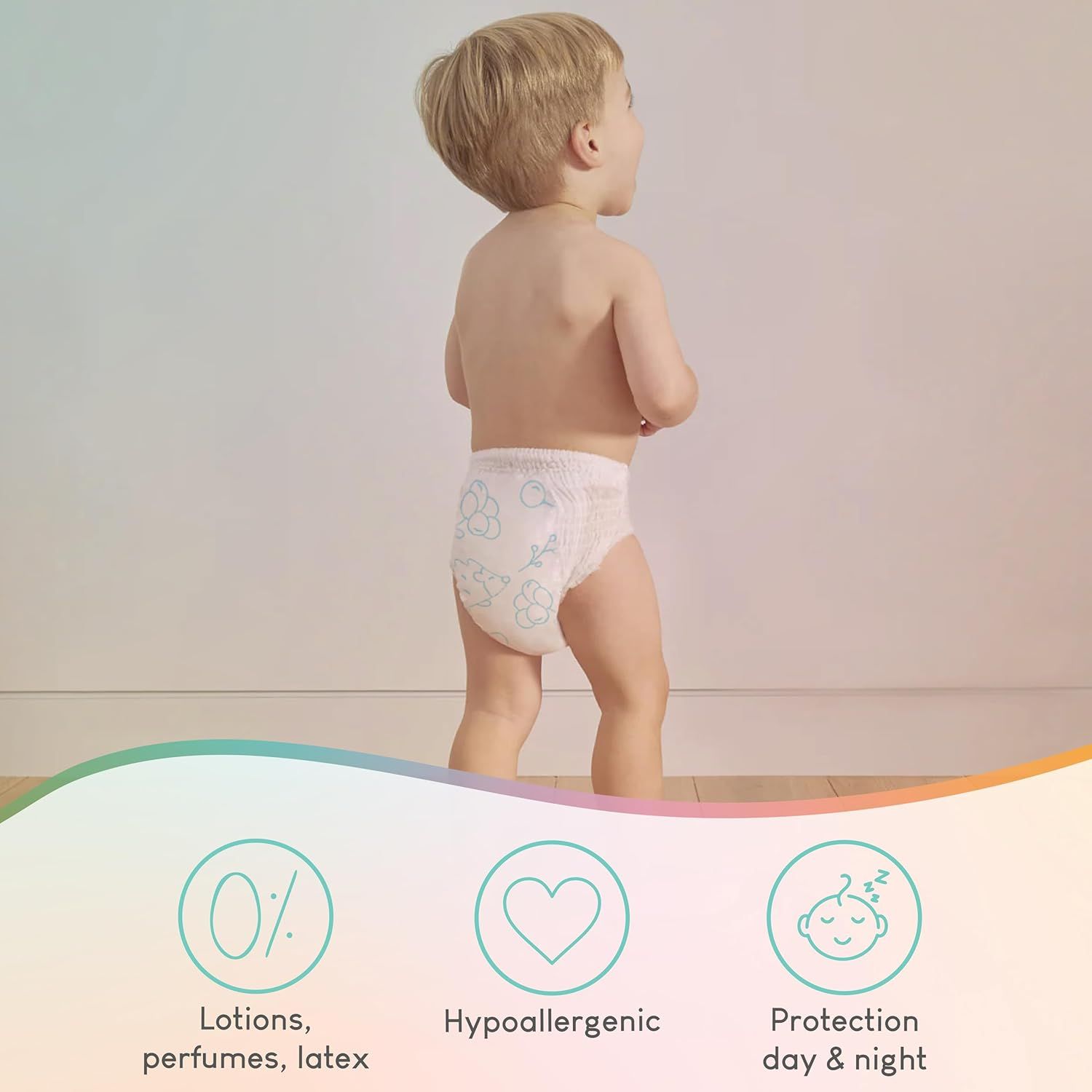 Peuter met Pillo Pants luier. Iconen voor lotionvrij, hypoallergeen, dag & nacht bescherming. Lichte achtergrond.