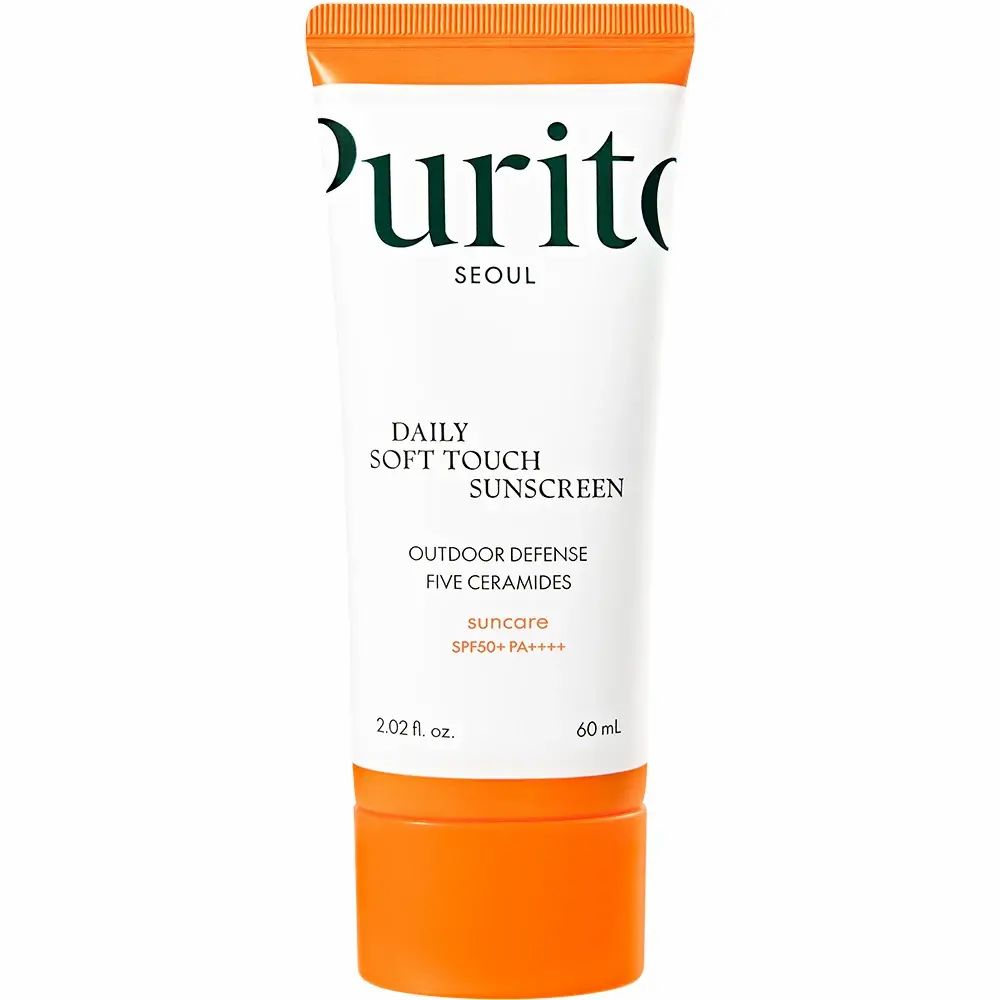 Witte tube met oranje dop. Opschrift: PURITO, Daily Soft Touch Sunscreen, SPF 50+ PA++++.