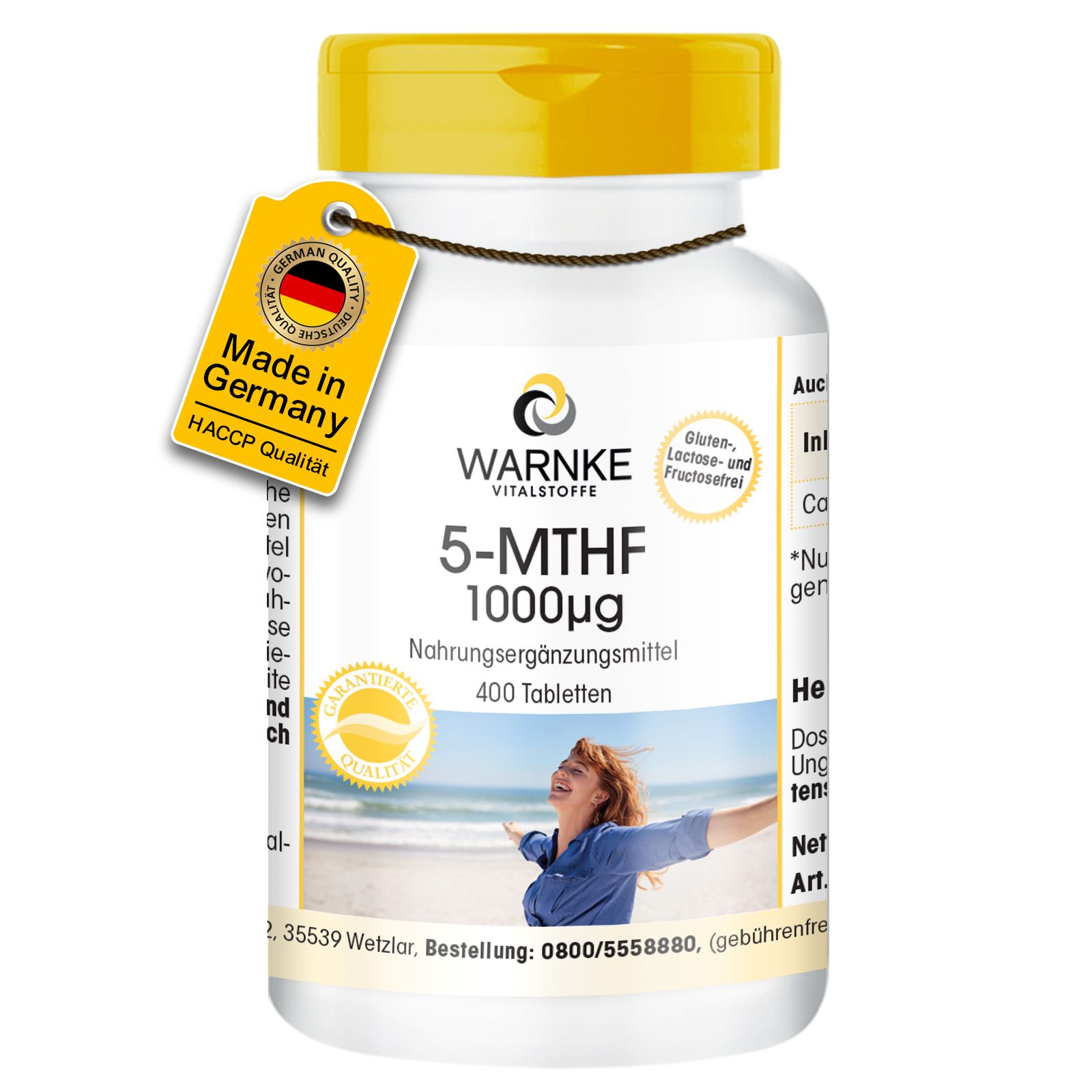 Flacon de pilules blanc avec couvercle jaune et étiquette. Inscription: WARNKE, 5-MTHF 1000µg, complément alimentaire, 400 comprimés. Sceau.